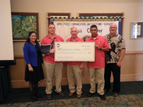 HAWAII—In June, Cmdr. Steve Jensen, USN, (Ret.) and U.S. Marine Corps guests representing the Navy/Marine Corps Warriors in Transition Organization receive 2012 TechNet Asia Pacific golf tournament proceeds. From left, Cynthia Pacheco, chapter chairman of the board and past president; Chief Warrant Officer 3 Ryan Eckroth, USMC; Cmdr. Jensen; Master Sgt. Hector Hernandez, USMC; and Ed Riglewicz, regional director.